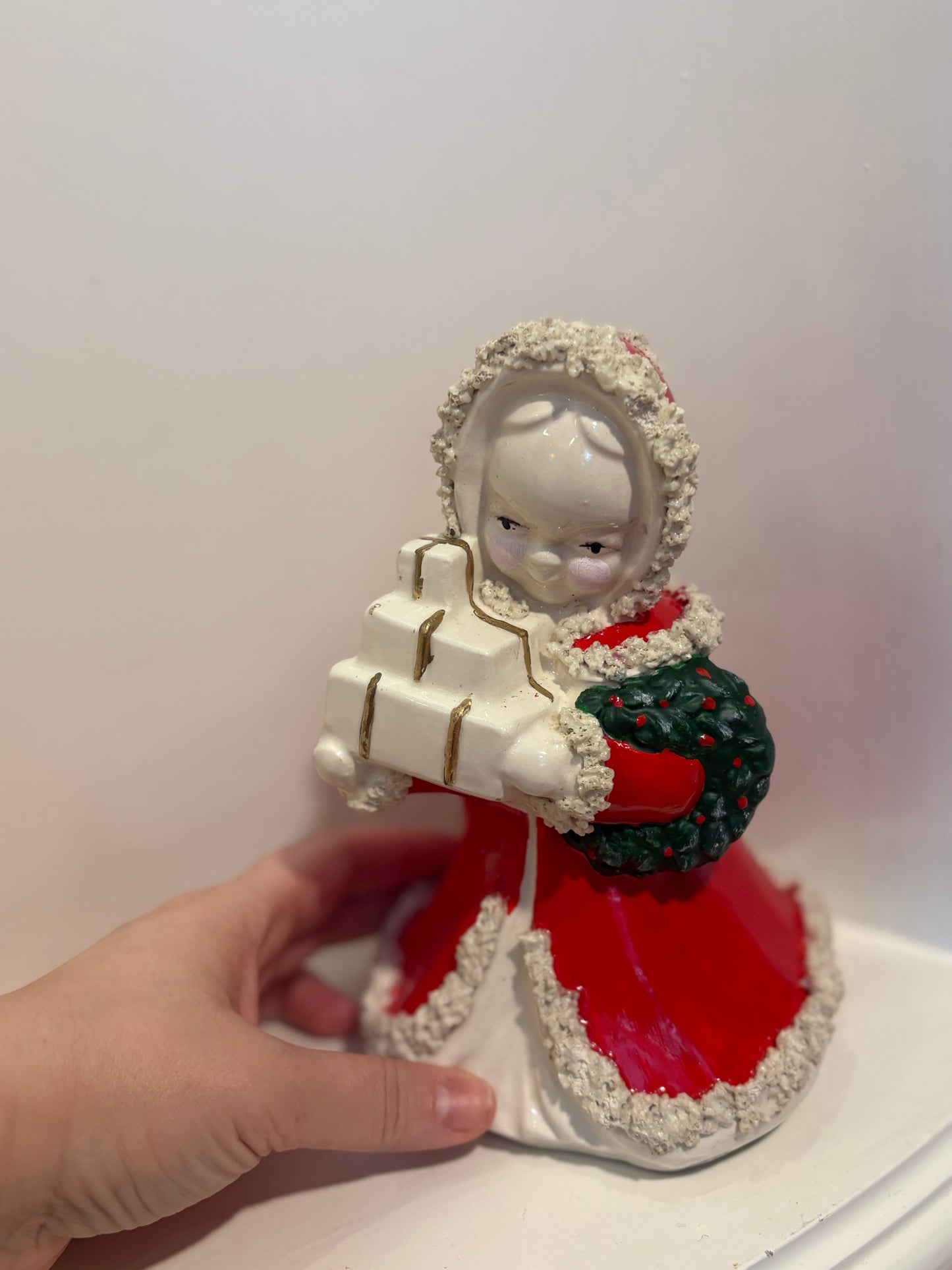 Christmas Shopping girl planter  with presents and wreath