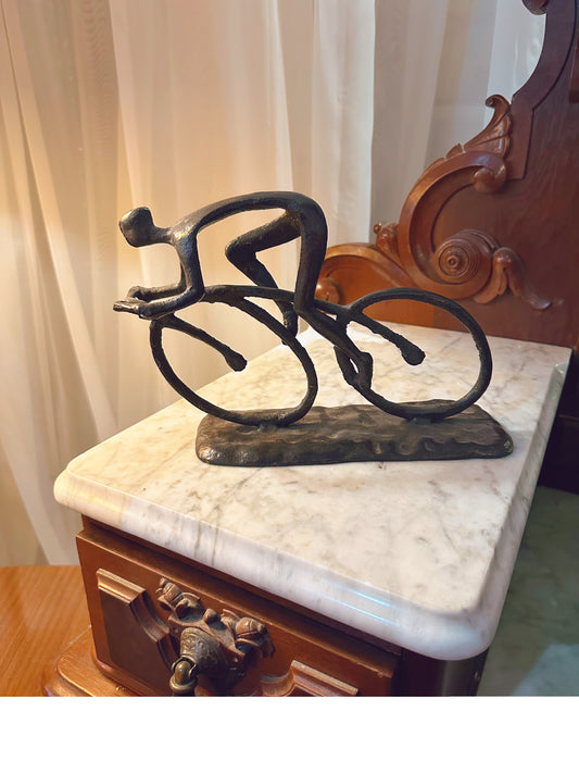 Brass bike sculpture