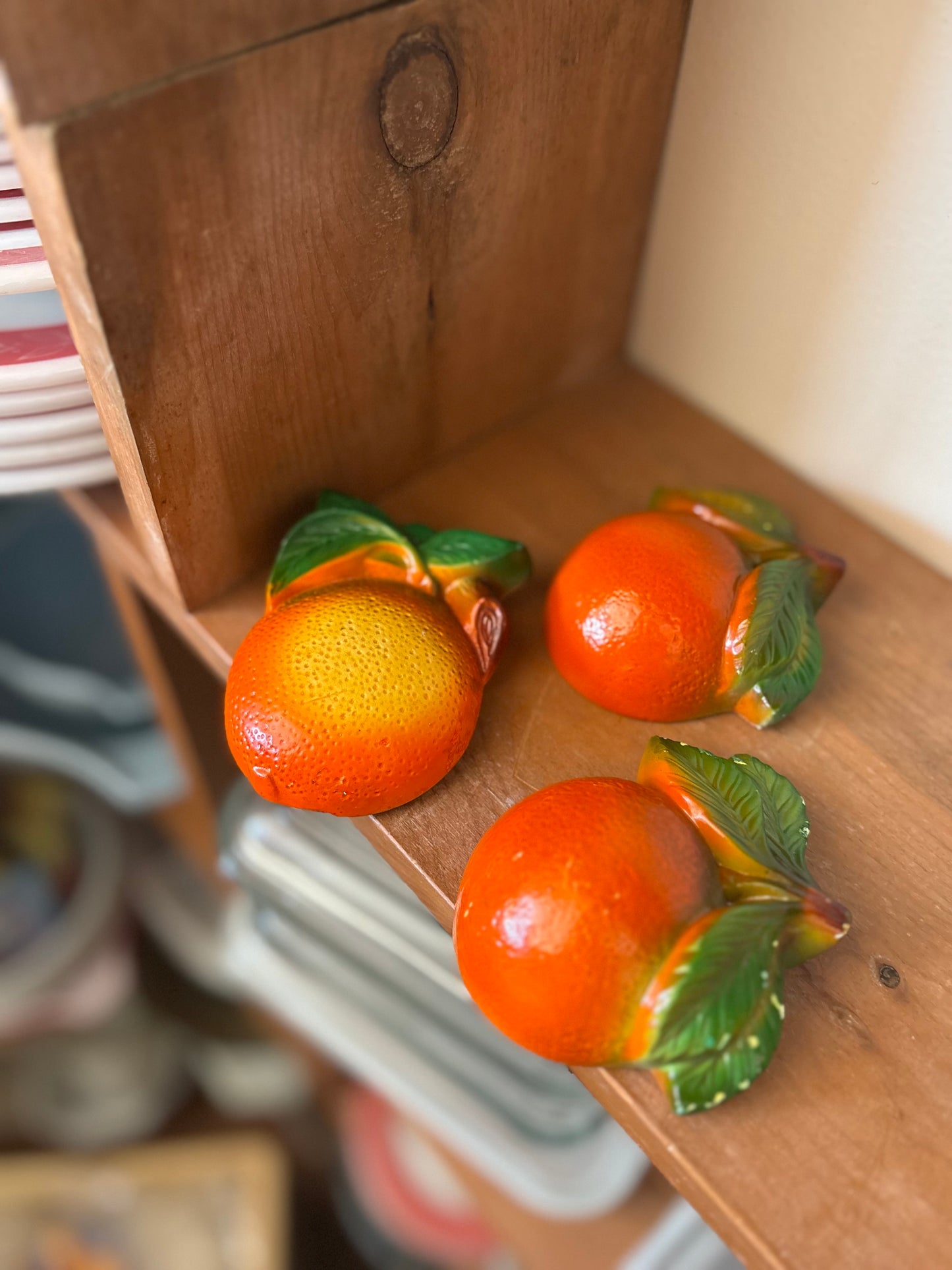 Chalkware hanging oranges