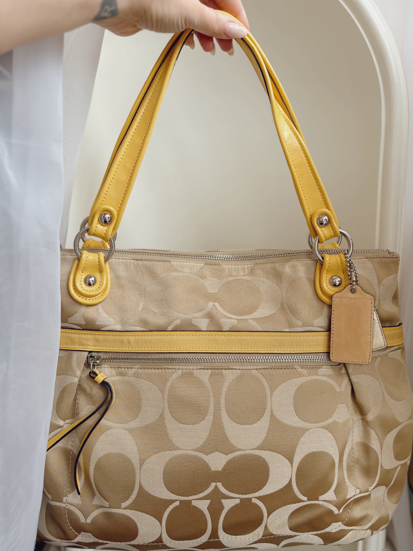 CC Monogram pattern coach handbag with yellow details