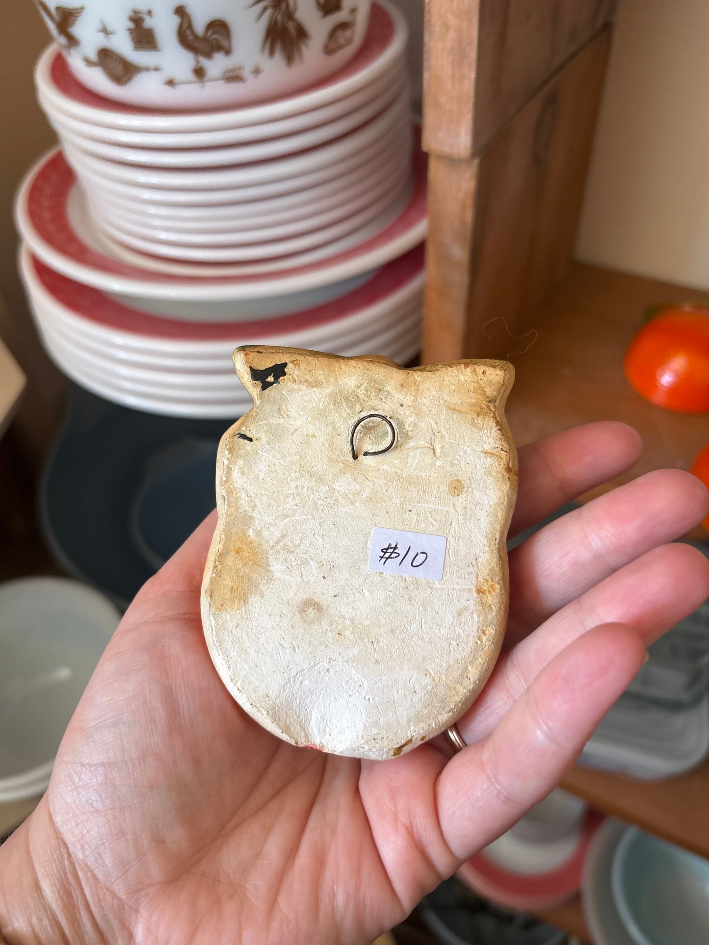 Chalkware hanging oranges