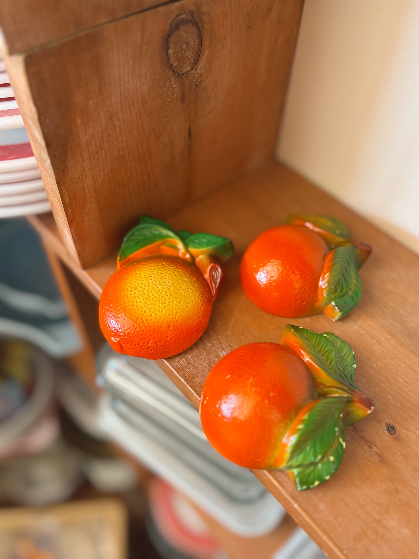 Chalkware hanging oranges