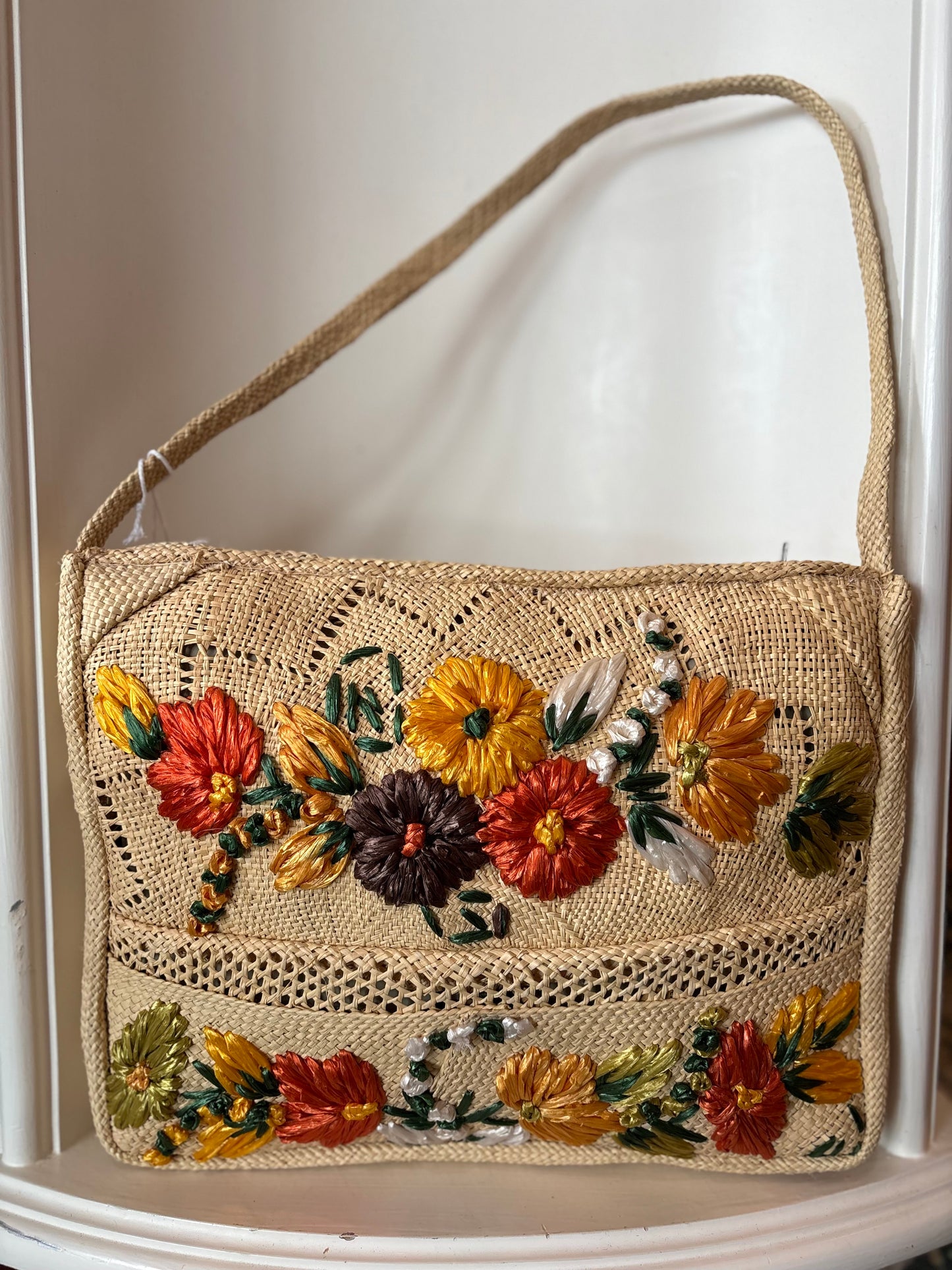 Woven floral shoulder bag