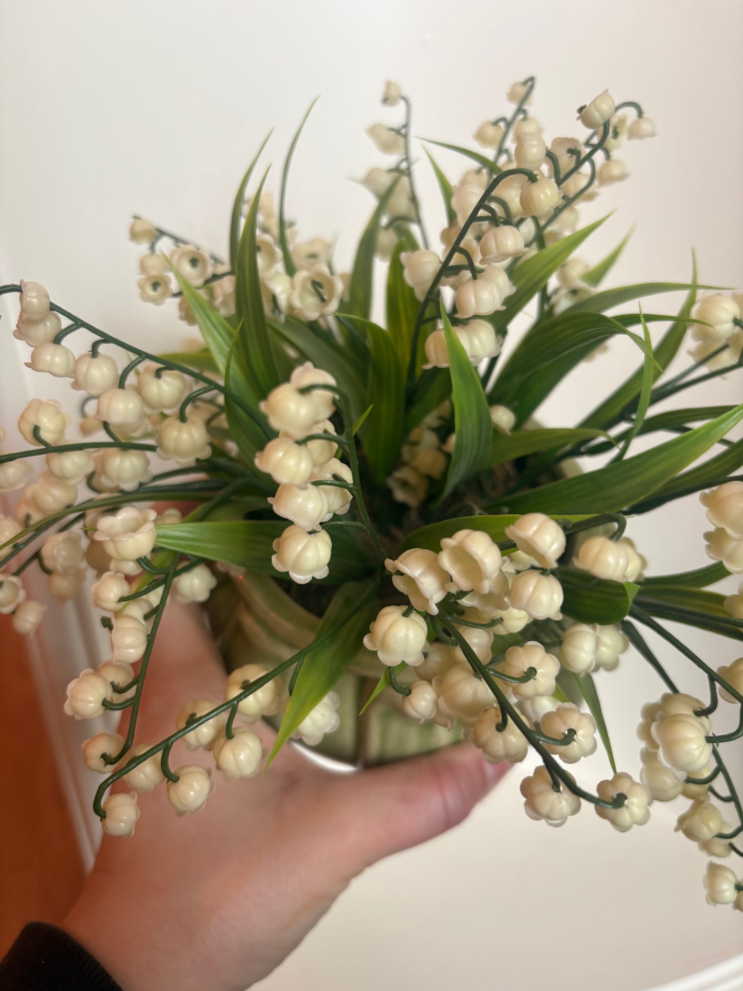 Faux Lily of the Valley in pottery vase
