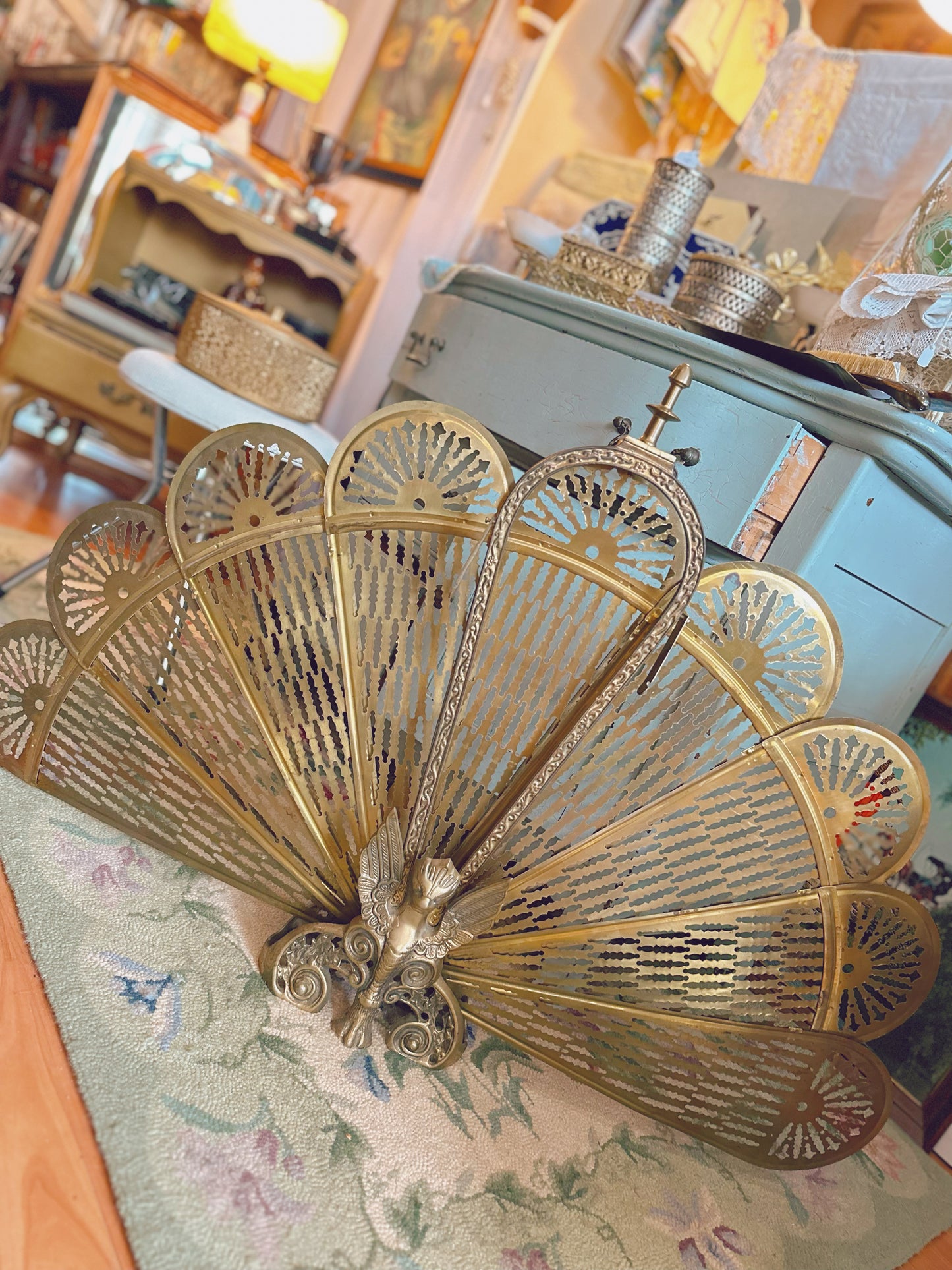 Brass fireplace fan screen with winged Gargoyle