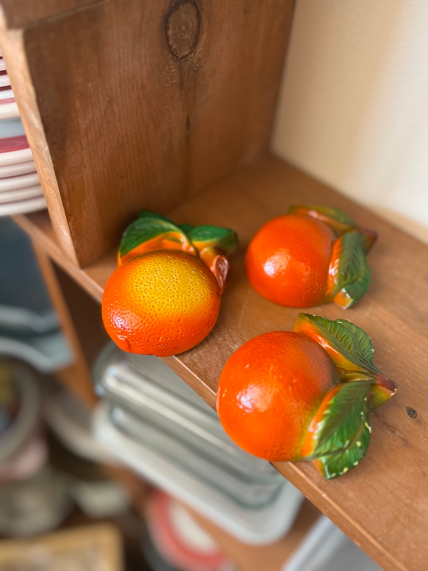 Chalkware hanging oranges