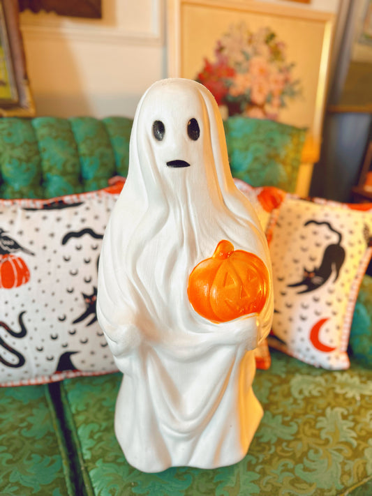 Medium sized vintage ghost holding pumpkin blow mold