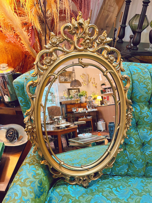 Gold Oval framed mirror