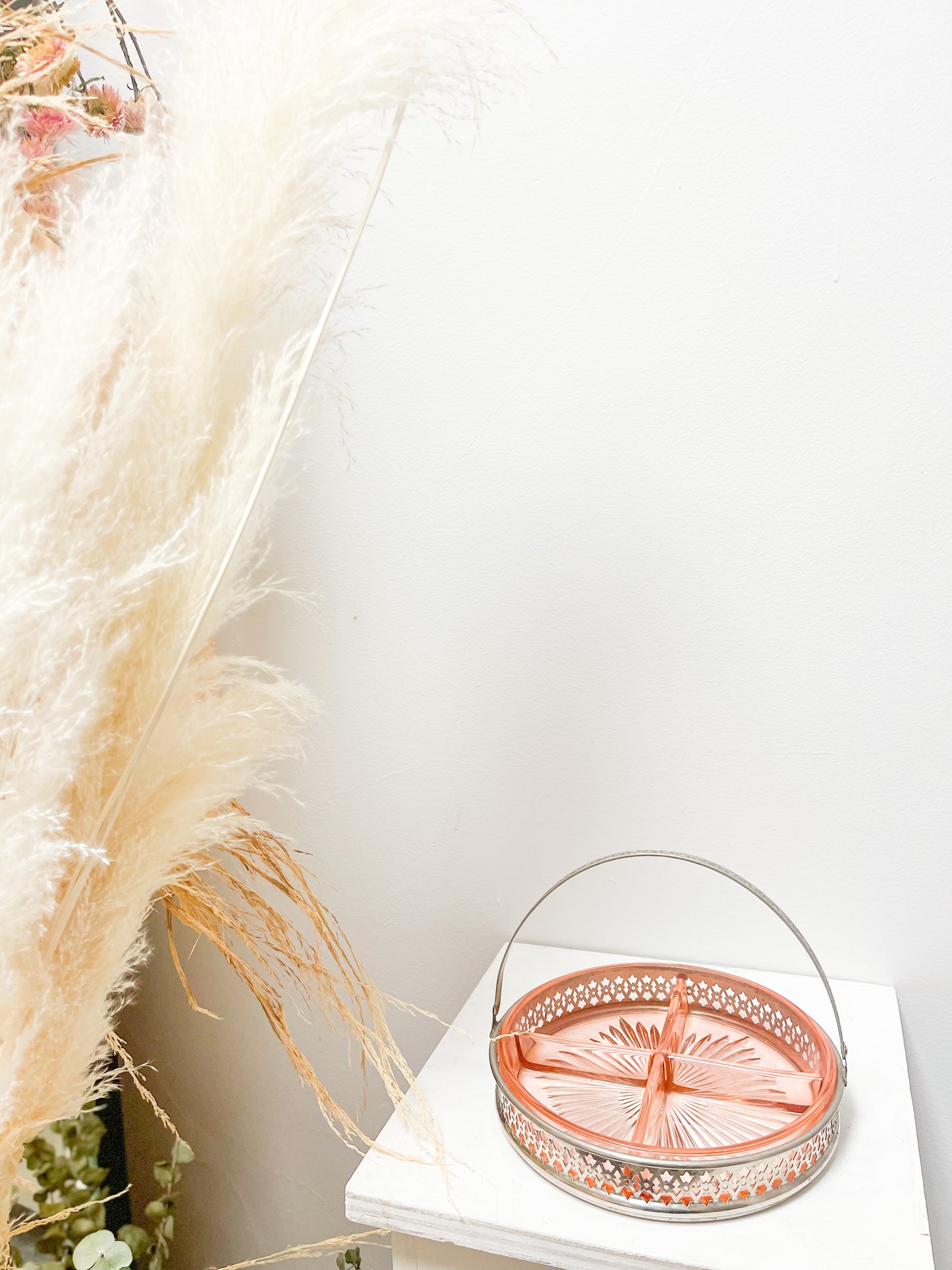 Pink glass dish with metal holder