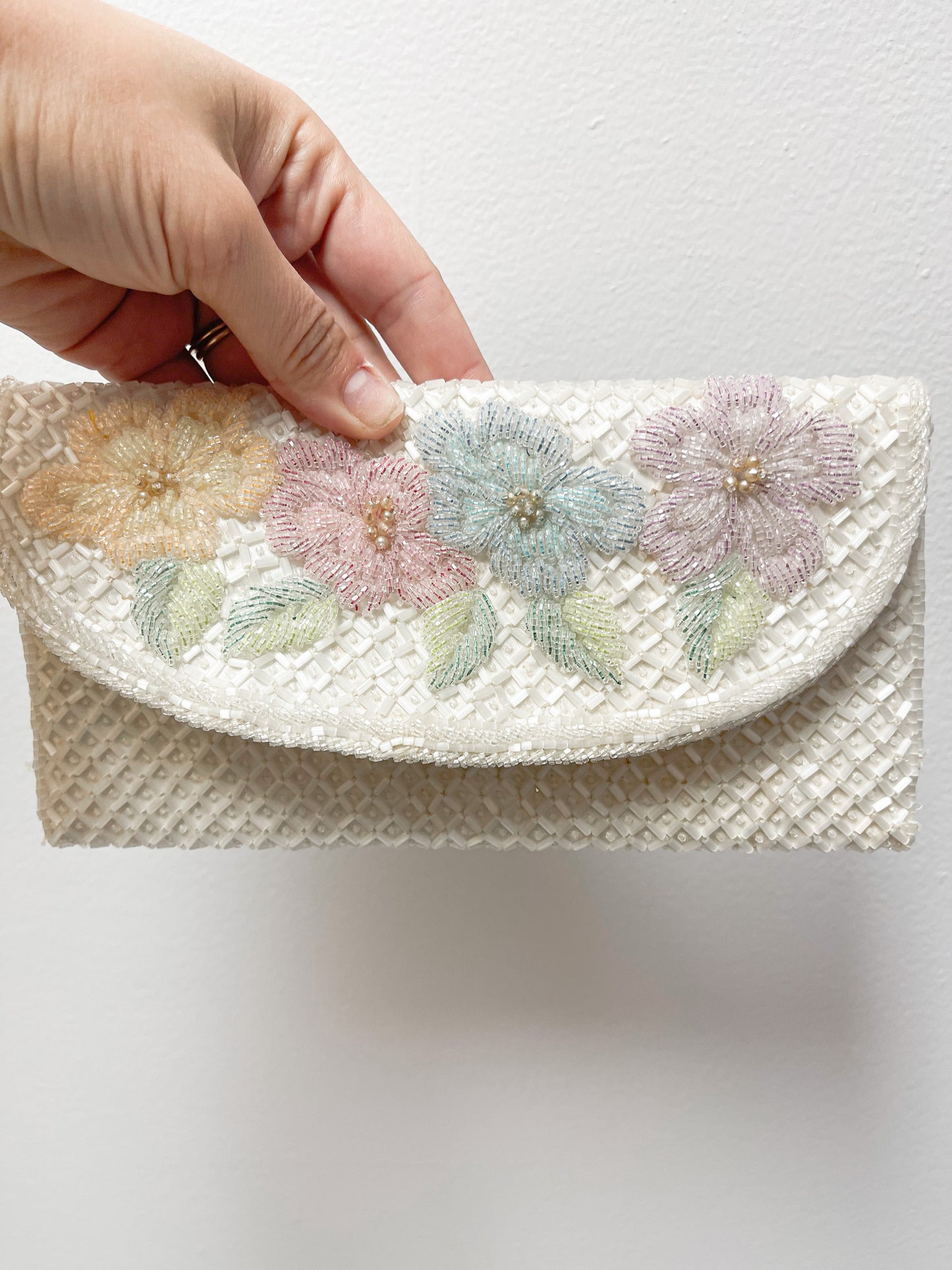 White beaded clutch with flowers