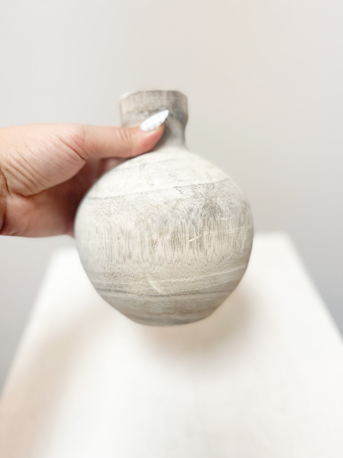 Small round wooden vase