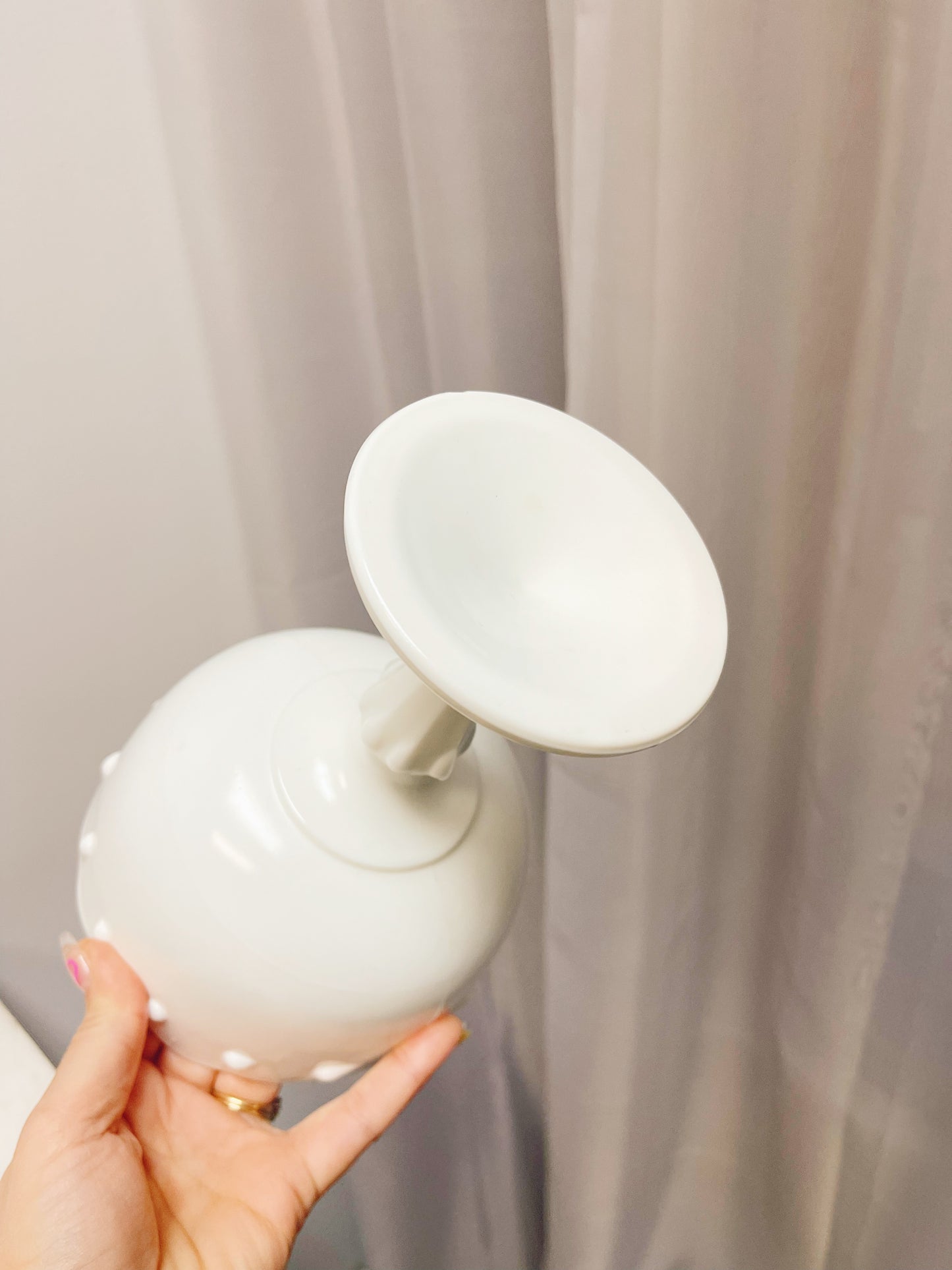 Milk glass pedestal bowl with tear drop detail