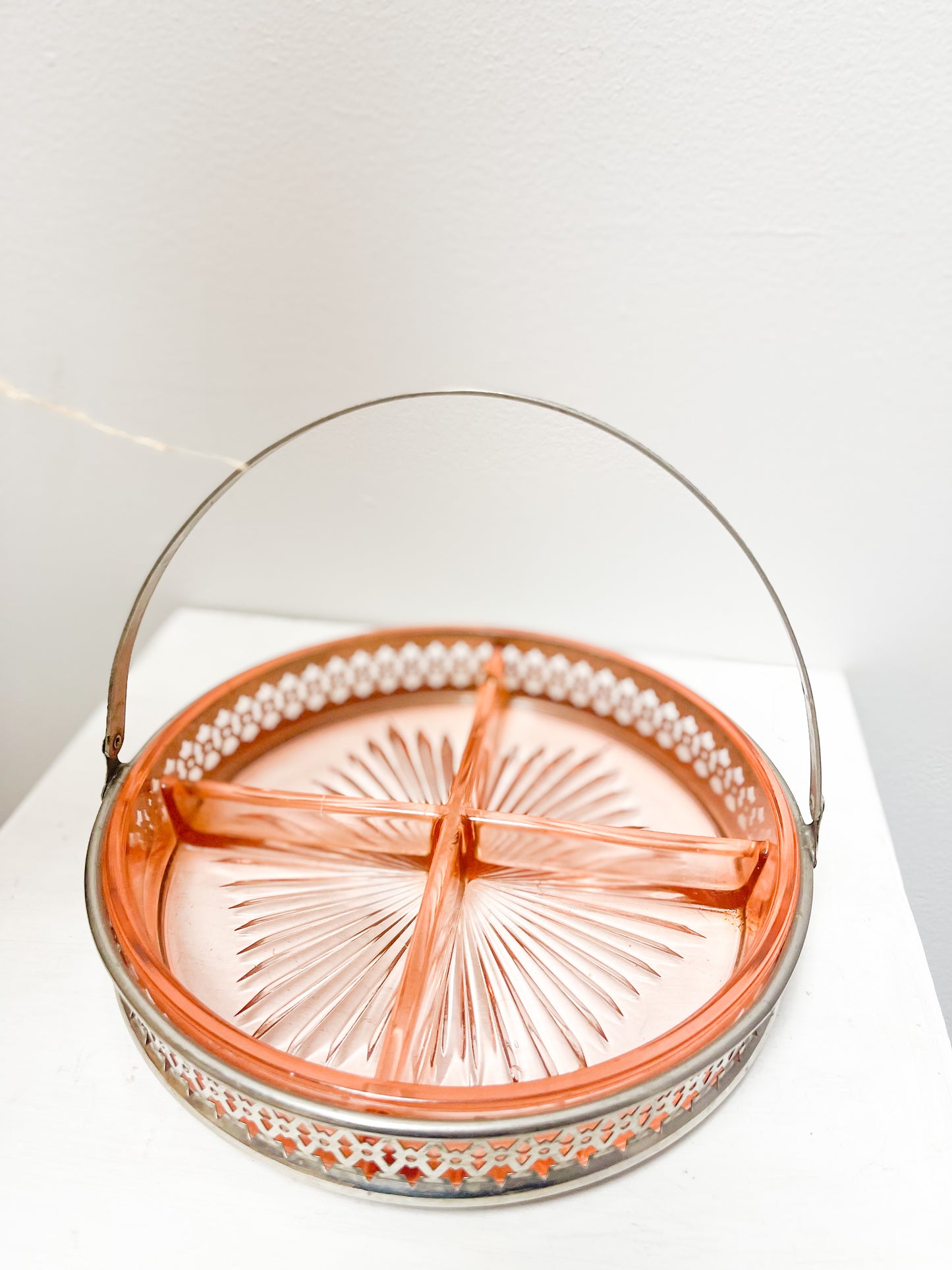 Pink glass dish with metal holder