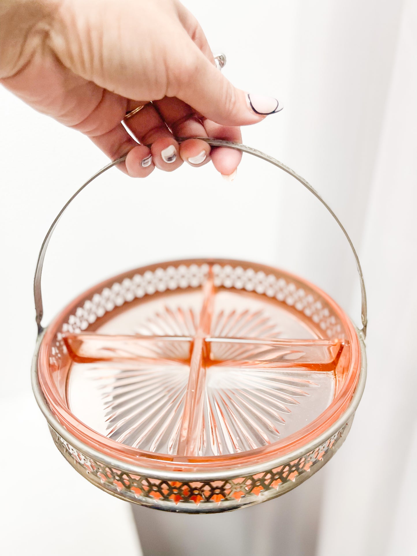 Pink glass dish with metal holder