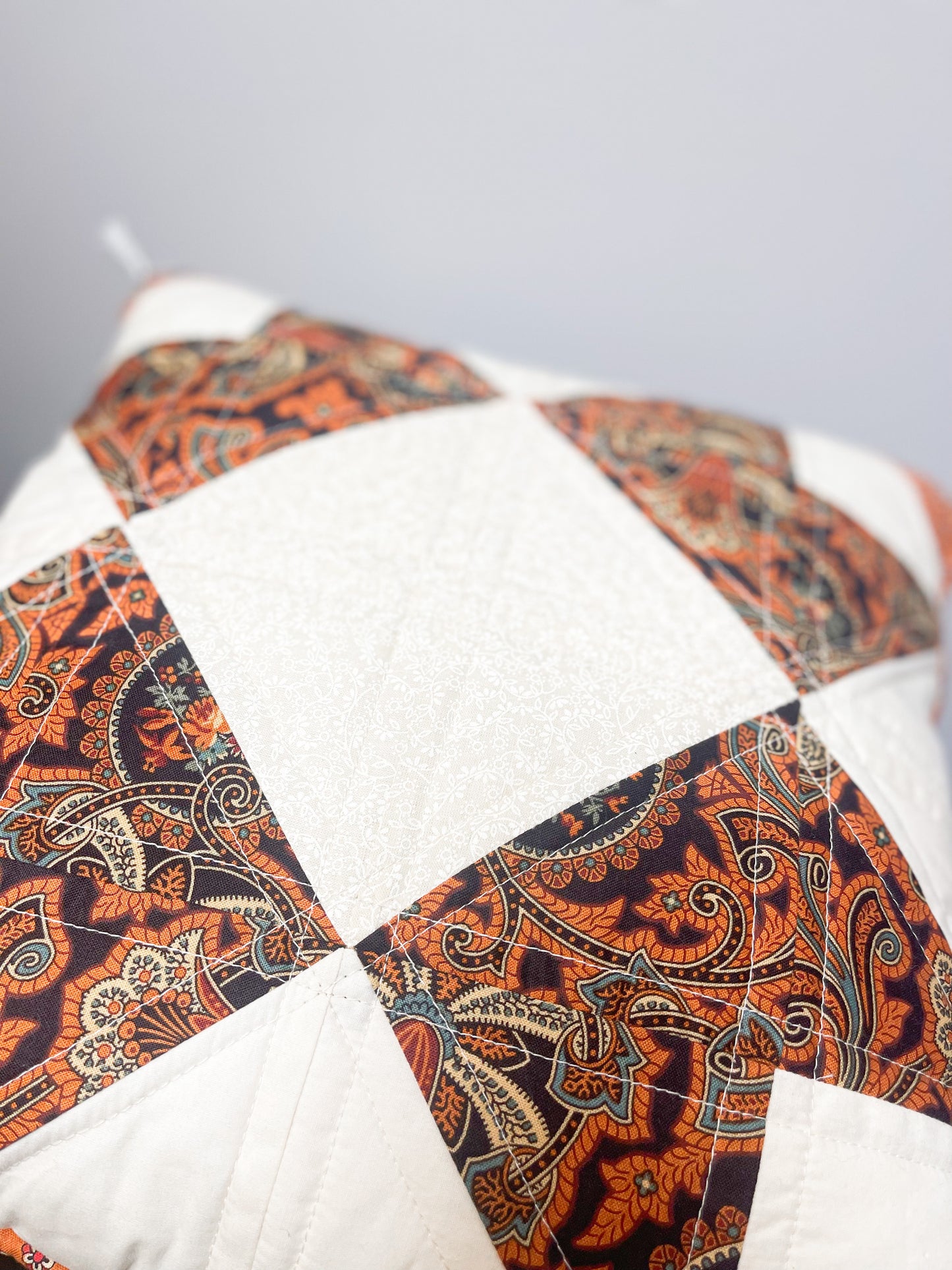 Orange Paisley Quilted Accent Pillow